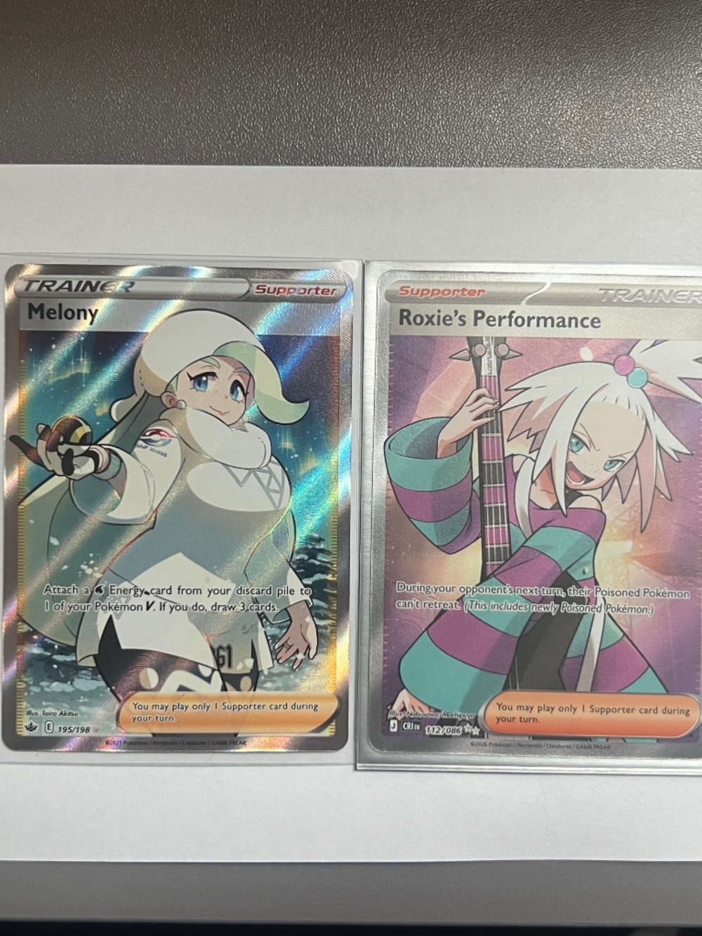 2 Pokemon Cards One Price: Melony 195/198 & Roxie’s Performance 112/086